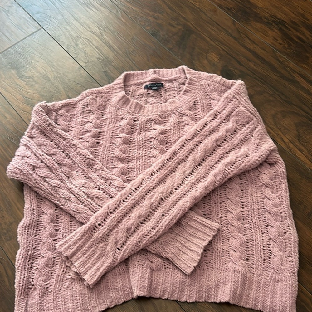 Super cute fall sweater great for being casual or dressing it up!